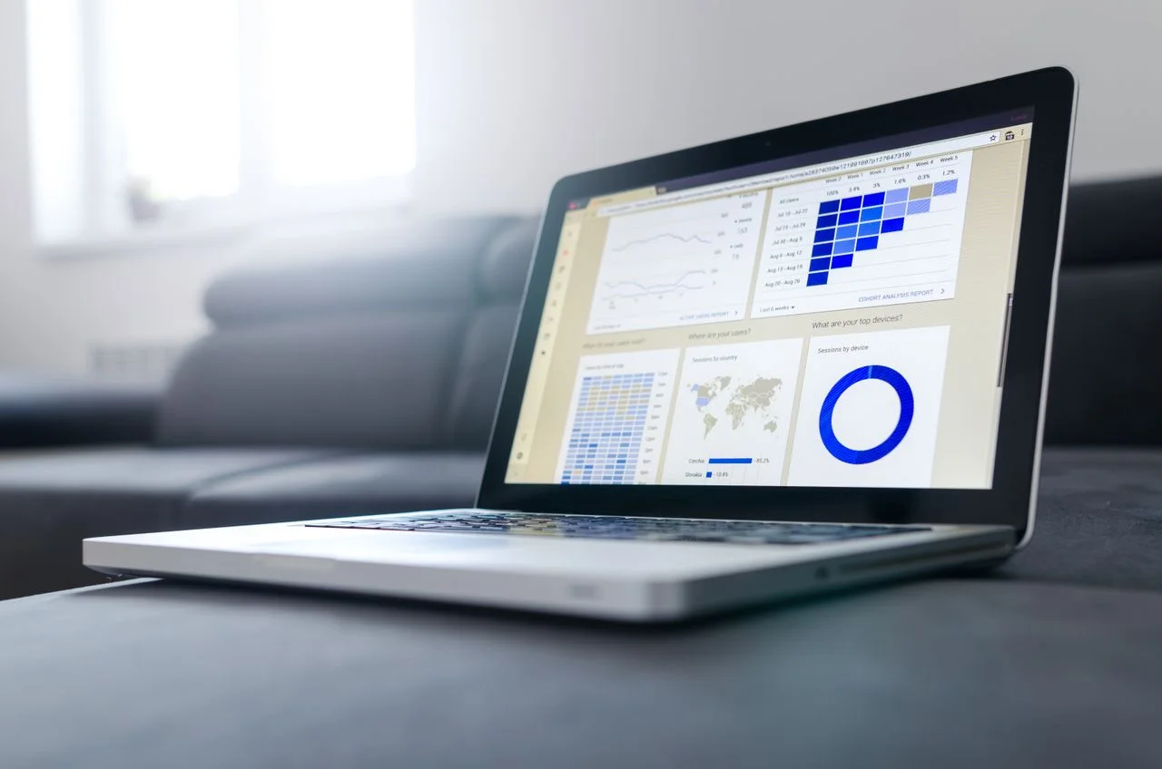 Website analytics dashboard displayed on a laptop, showing traffic reports, user insights, and performance metrics for SEO and digital marketing.